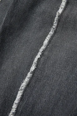MM6 MAISON MARGIELA Jeans nero con dettagli a taglio vivo | Bambino Jeans | Denim-Mania