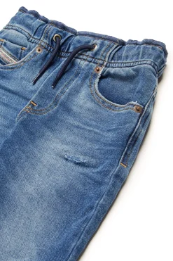 DIESEL JoggJeans® relaxed blu medio con rotture - D-Marcie-B | Bambino Jeans | Denim-Mania