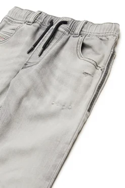 DIESEL JoggJeans® tapered grigio con strappi - Krooley | Bambino Denim-Mania | Denim-Mania