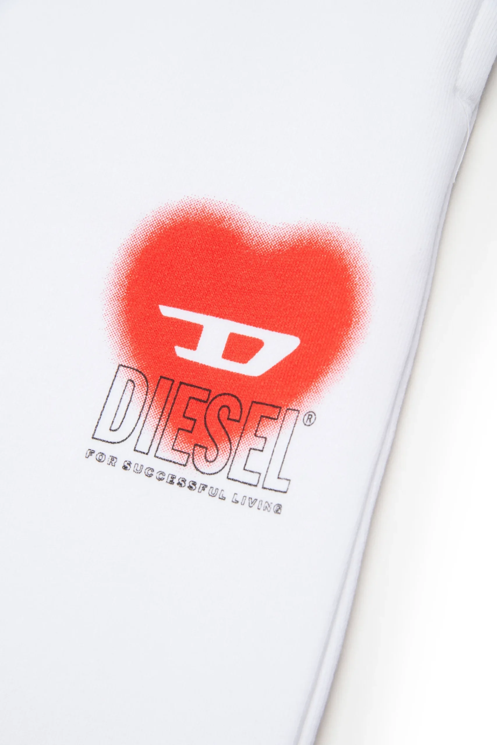 DIESEL Pantaloni in felpa con grafica cuore | Pantaloni