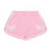 N°21 Shorts in felpa con fiocchi in pizzo | Bambino Shorts | Activewear